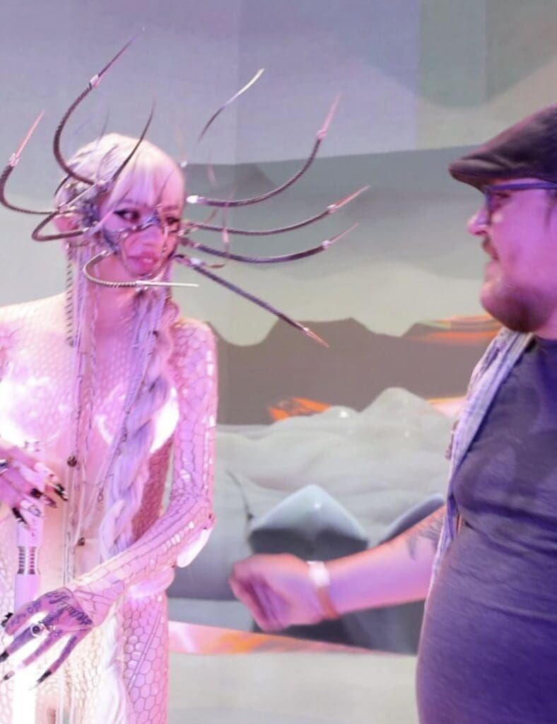Fashion designer Lance Victor Moore with singer Grimes.