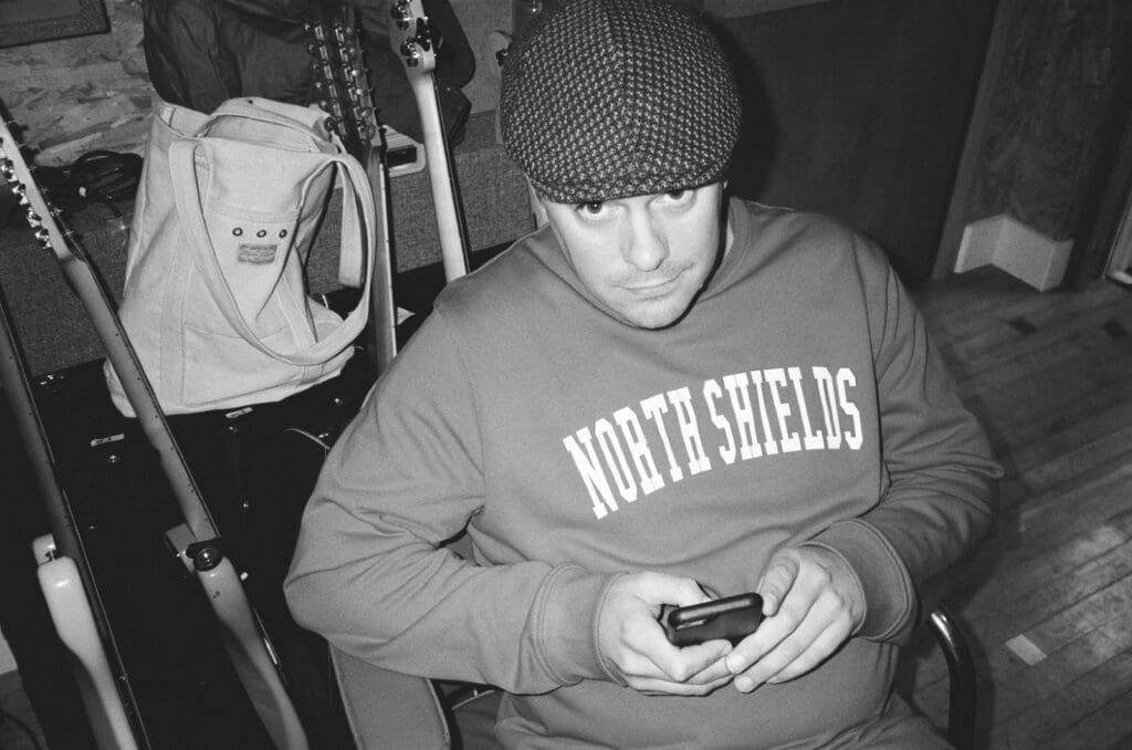 Thom Lewis pictured by Joe Doherty, wearing a 'North Shields' hoodie.